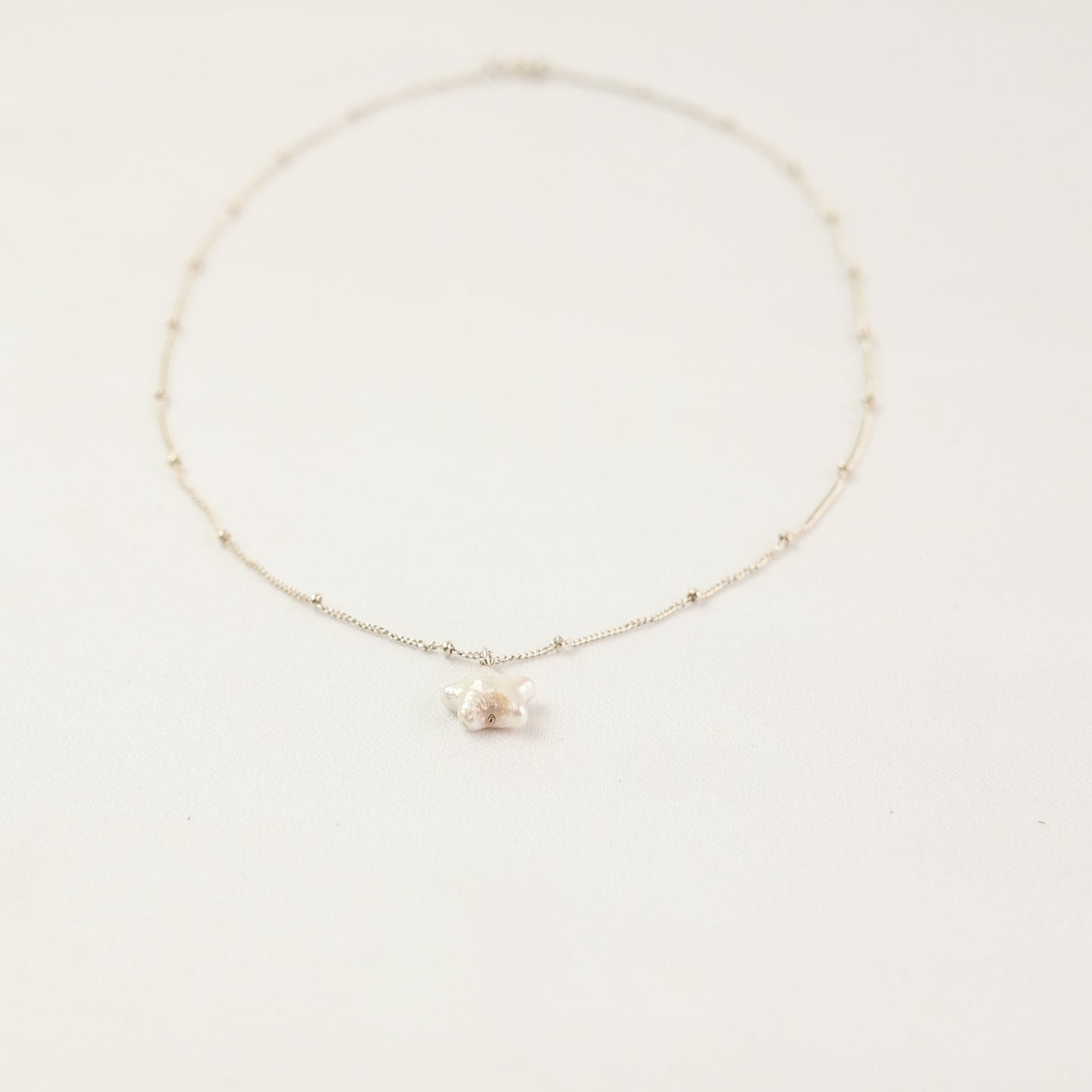 Suri Necklace - Star Pearl Necklace