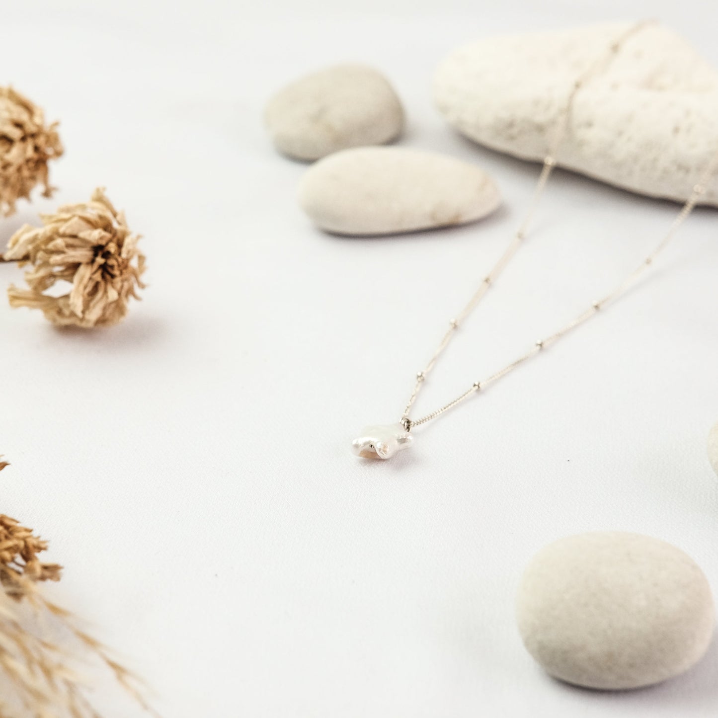 Suri Necklace - Star Pearl Necklace